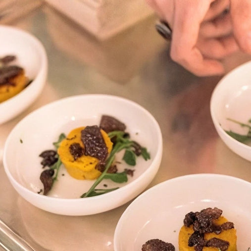 Assiettes gastronomiques préparées par les chefs Eataly